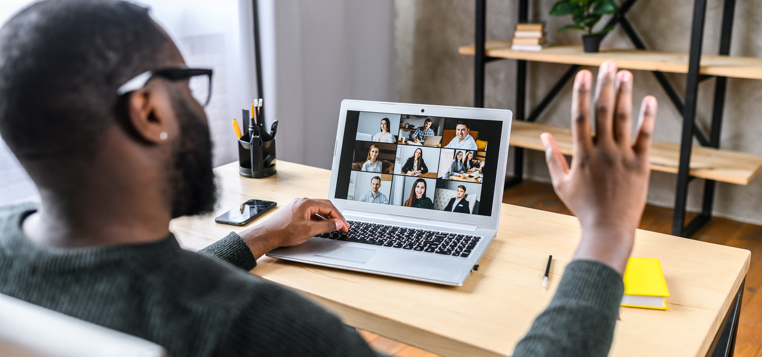 man using laptop for webinar
